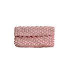 Rose gold seashell clutch by VERDI with textured surface and elegant design, perfect for evening accessories.