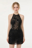 Black Amira lace mini dress by 21Six, featuring elegant lace details and a fitted silhouette, perfect for stylish occasions.