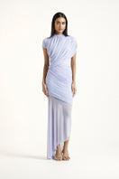Deme by Gabriella Alina maxi dress in periwinkle color, flowing fabric and elegant design, displayed on a model.