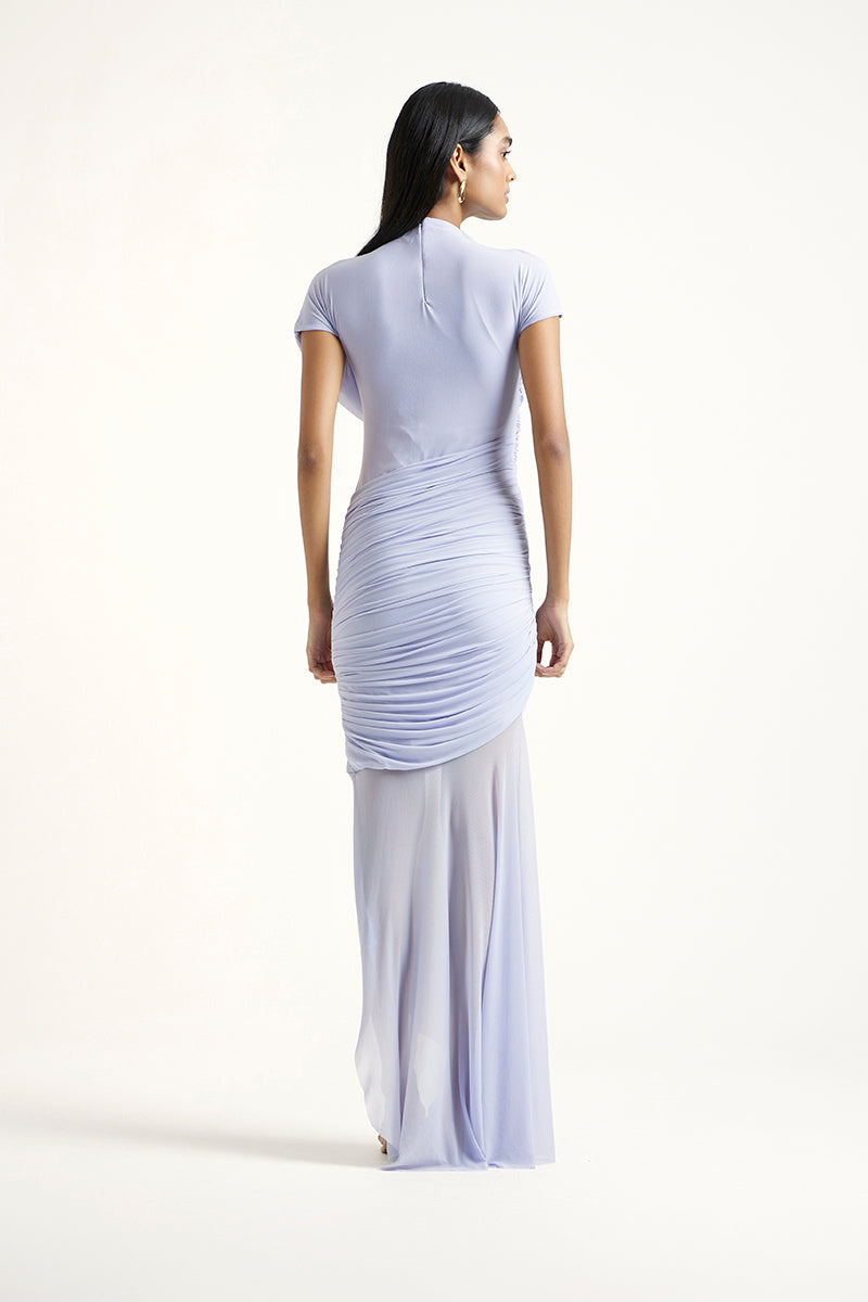 Deme By Gabriella Alina Maxi Dress in periwinkle color, flowing fabric with a fitted bodice and elegant length.