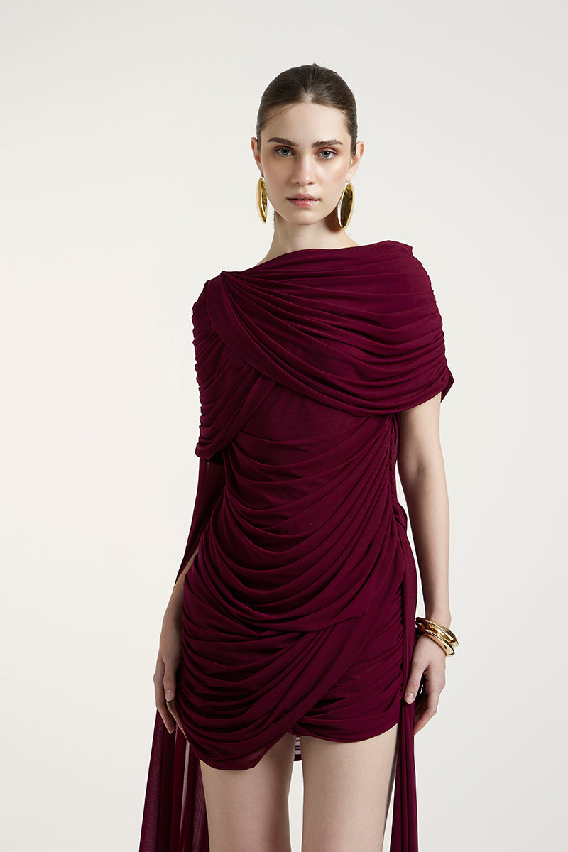 Deme By Gabriella Nicole aubergine mini dress, fitted style, with short sleeves and a sleek silhouette, shown on a model.