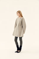 Gray dropped shoulder coat by Chictopia, stylish outerwear with relaxed fit and tailored design, ideal for fall and winter.