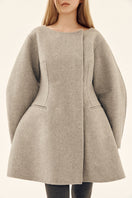 Gray dropped shoulder coat by Chictopia, stylish outerwear with relaxed fit and tailored details, perfect for layered winter looks.