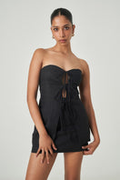 Black Lagos top by Summer Away, sleeveless and stylish, shown on a model with a close-up view of the fabric and neckline.