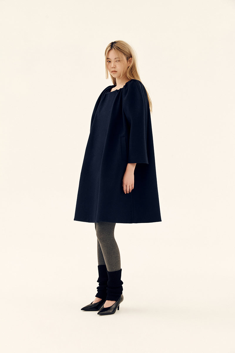 Chictopia midnight cocoon coat in navy, stylish oversized coat with a relaxed fit and soft fabric, ideal for colder weather.