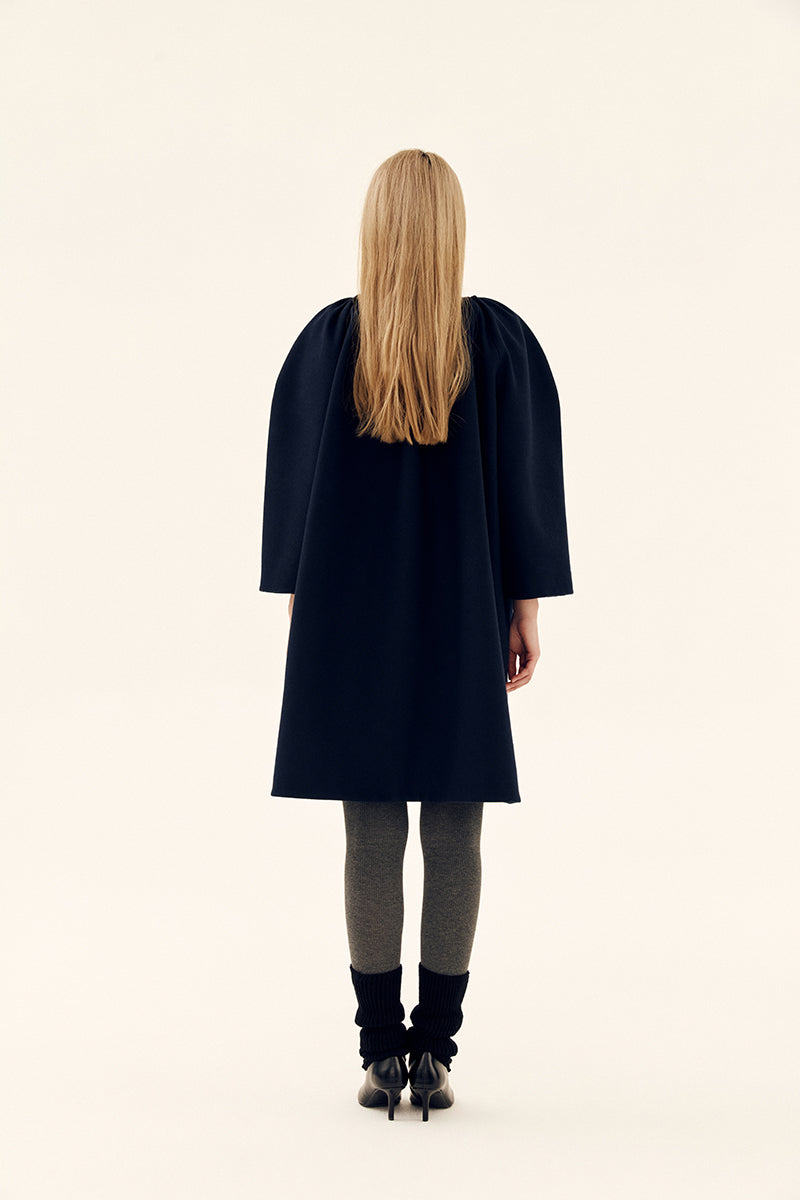 Chictopia midnight cocoon coat in navy, stylish and cozy outerwear with a relaxed fit and soft fabric for cold weather.