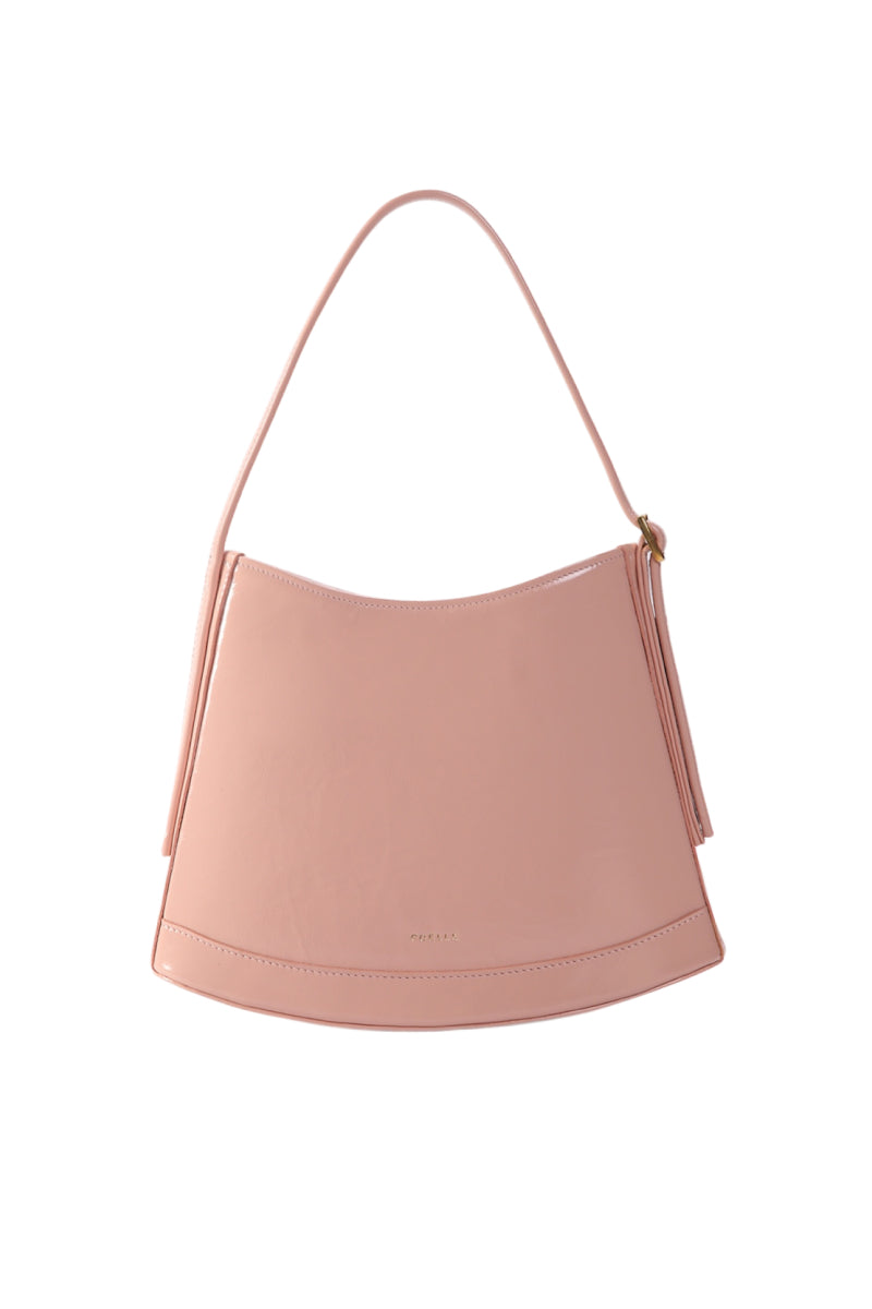Pink POELLE Bell mini top handle bag with gold hardware and adjustable strap, stylish accessory for everyday use.