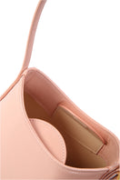 Pink POELLE Bell mini top handle bag featuring a sleek design and compact size, perfect for stylish everyday use.