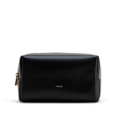 Poelle black clutch make-up bag with sleek design, compact size, and smooth exterior, perfect for cosmetics and accessories storage.