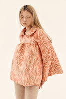Chictopia salmon-colored neoprene babydoll top, stylish and fitted sleeveless fashion top for women.