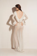 White Valenciani mermaid mesh maxi dress featuring a fitted silhouette and elegant design, perfect for special occasions.