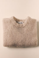 Light gray hand-knitted sweater by Chictopia, featuring a cozy, textured knit pattern perfect for casual wear.