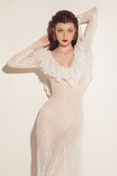 White Valenciani mermaid mesh dress, maxi style with intricate see-through mesh details, elegant and flowing.