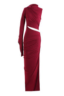 Aquarel Studio Gaia maxi dress with flowing fabric, floral pattern, and sleeveless design on model.