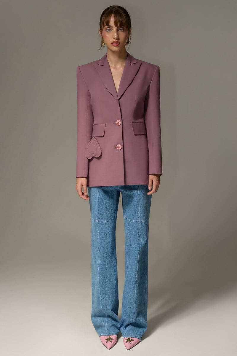 Liya Purple Passion Blazer in vibrant purple, tailored fit with notched lapels and long sleeves, displayed on a hanger.