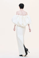 Nihan Peker Najla Bubble Gown in flowing fabric with voluminous design and elegant silhouette, displayed on a mannequin.