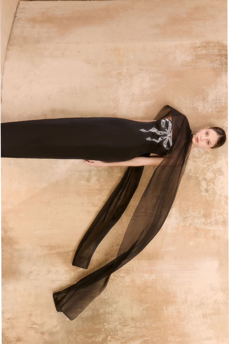 Elegant Arti Apparel renta gown with intricate details, flowing fabric, and a sophisticated design for special occasions.