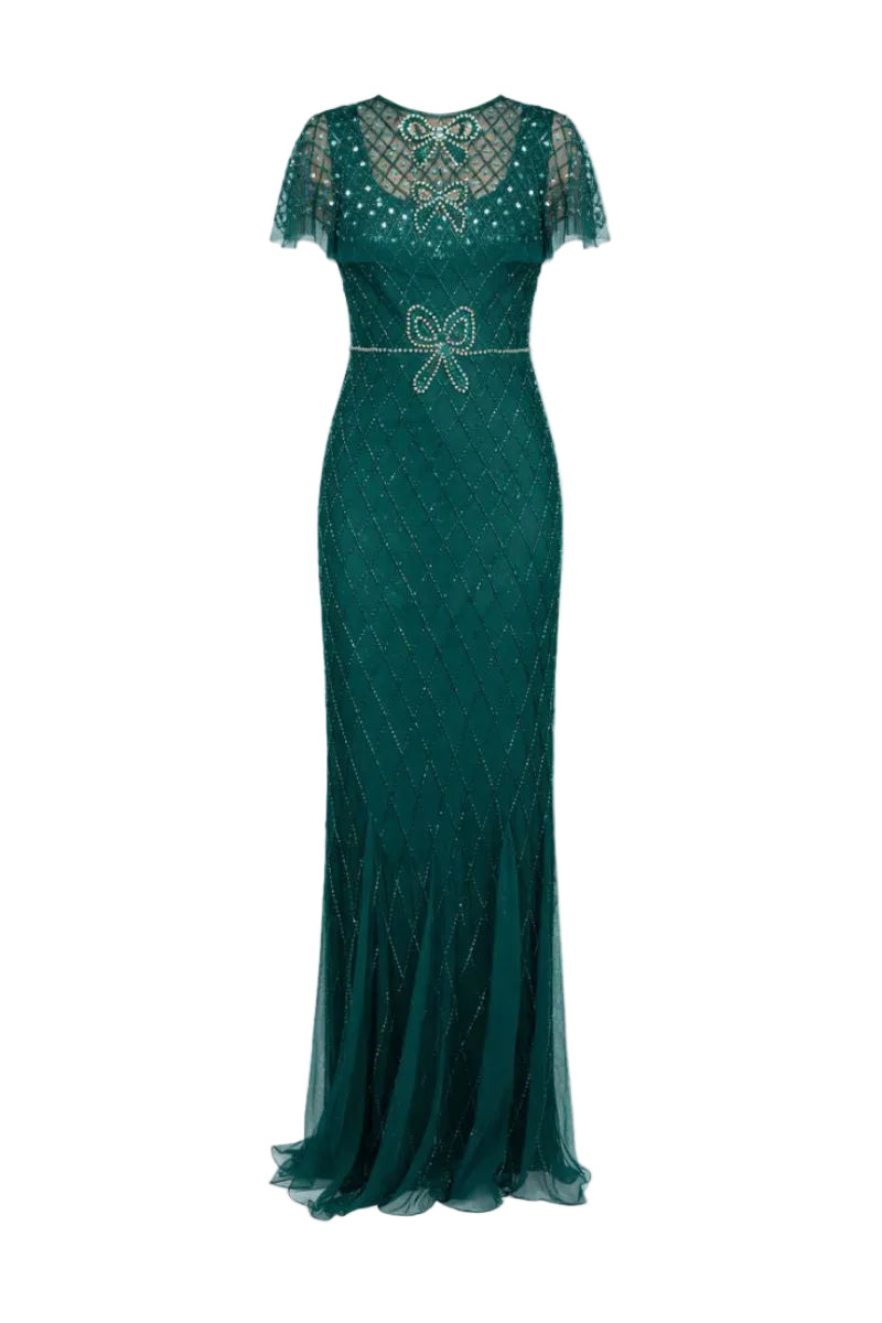 Elegant Raishma Nina Gown featuring intricate lace details and a flowing silhouette, perfect for formal occasions.