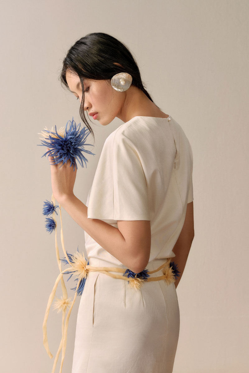 LECIA Bloom mini dress in ivory featuring a stylish, fitted design with short sleeves and a flattering silhouette.