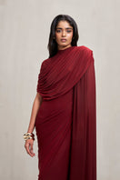 Elegant burgundy Dianna gown by Deme By Gabriella, featuring flowing fabric and sophisticated design.