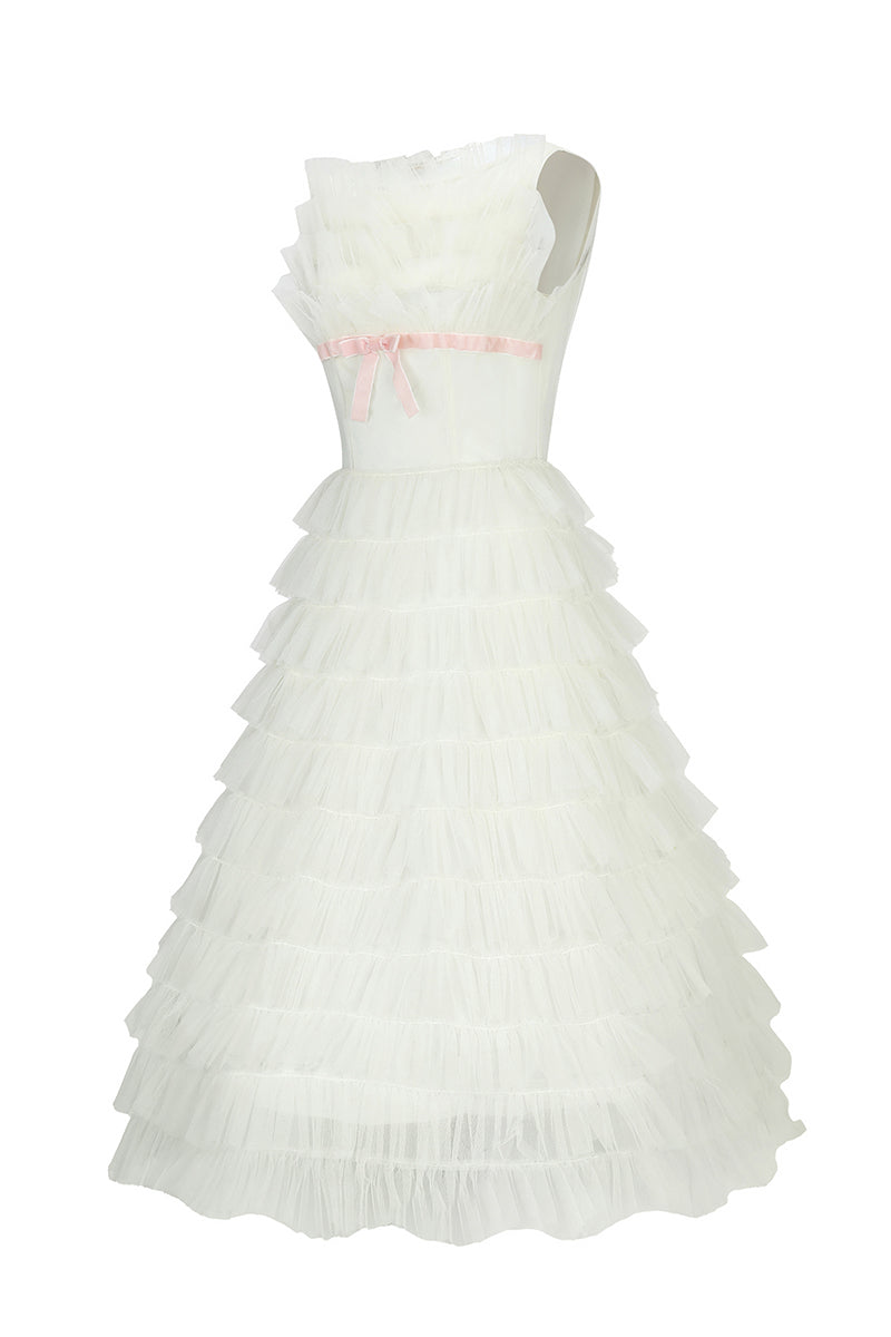 Ivory Deborah midi dress by Chictopia, featuring a flowy fabric and elegant design, displayed on a hanger against a neutral background.