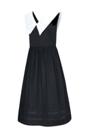 Black Sydney midi dress by Chictopia, shown on a model with a fitted bodice and flowing skirt, perfect for stylish occasions.