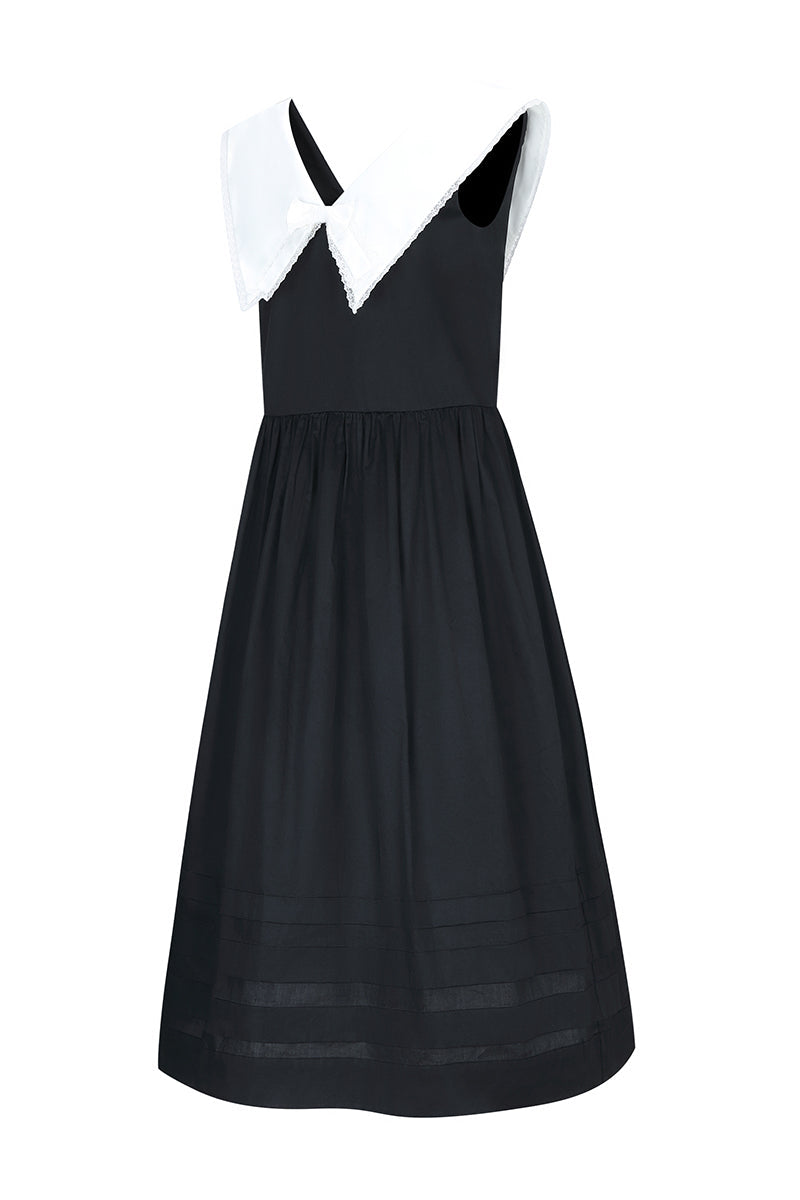 Black Sydney midi dress by Chictopia, shown on a model with a fitted bodice and flowing skirt, perfect for stylish occasions.