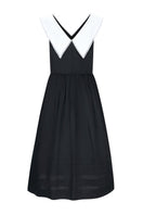 Chictopia Sydney black midi dress displayed on a hanger with a fitted bodice and flowing skirt.