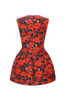 Sculpted neoprene mini dress in floral design by Chictopia, featuring a fitted silhouette and vibrant botanical pattern.