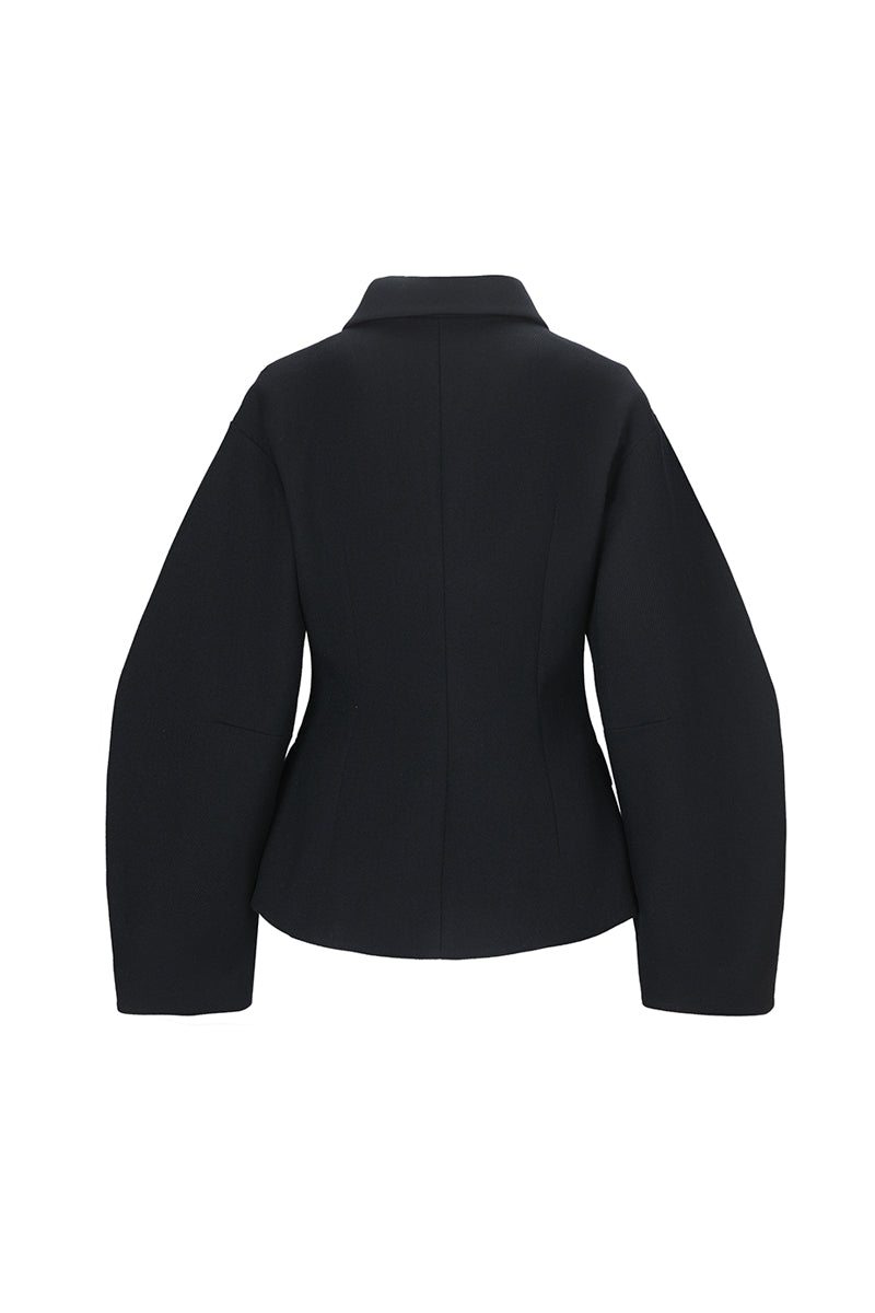 Black sculpted volume jacket from Chictopia showing the fitted silhouette and modern design details.