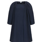 Chictopia midnight cocoon coat in navy, stylish and cozy outerwear with a relaxed fit, shown on a model.