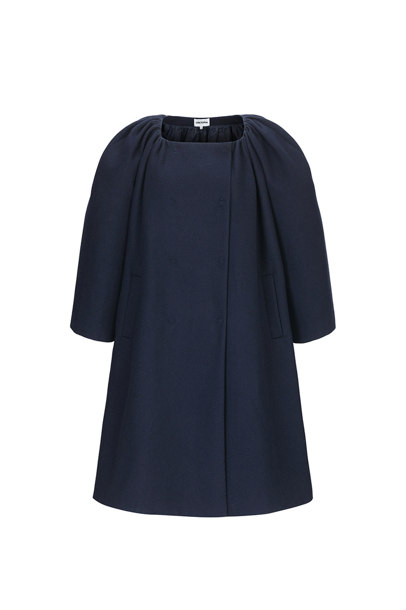 Chictopia midnight cocoon coat in navy, stylish and cozy outerwear with a relaxed fit, shown on a model.