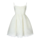 Chictopia ivory ethereal shirred silk mini dress with flowing fabric and delicate details, perfect for elegant occasions.