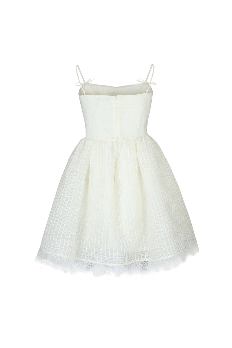 Chictopia ivory ethereal shirred silk mini dress, lightweight and elegant with flowing fabric and delicate detailing.