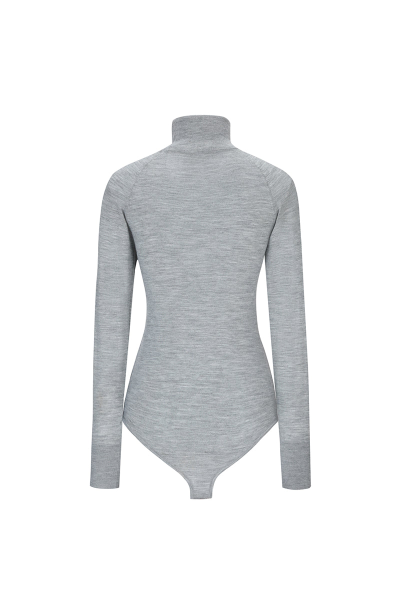 Chictopia gray merino wool bodysuit displayed on a hanger, showcasing soft knit fabric and fitted design for stylish tops.