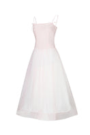 Light pink Cynthia maxi dress by Chictopia displayed on a model, featuring a flowing silhouette and elegant design.
