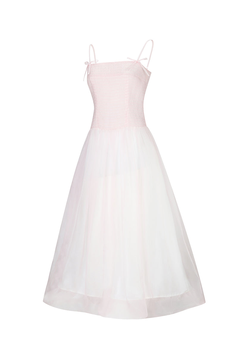 Light pink Cynthia maxi dress by Chictopia displayed on a model, featuring a flowing silhouette and elegant design.