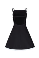 Black Linda mini dress by Chictopia, featuring a stylish design, fitted silhouette, and elegant details, perfect for casual or dressy occasions.