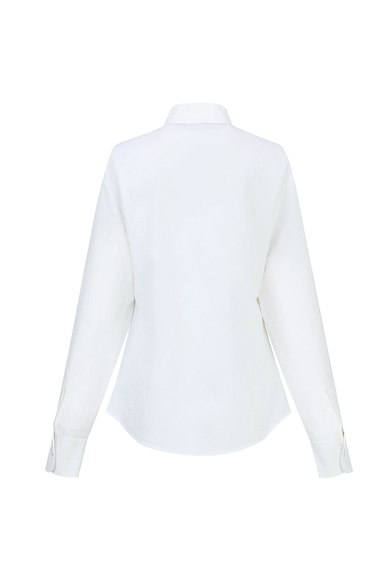 Chictopia ivory popling shirt displayed on a hanger, showcasing its lightweight fabric and casual style.