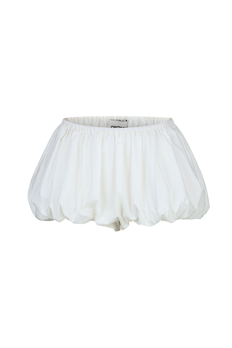 Chictopia ivory poplin shorts displayed on a hanger, showcasing lightweight fabric and classic summer style.