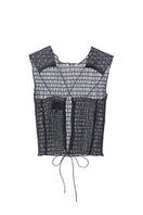 Black organza tank top from Chictopia, lightweight sleeveless top with sheer fabric and delicate design for stylish casual wear.