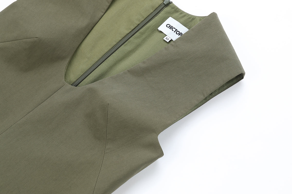 Khaki cotton mini dress by Chictopia, featuring a fitted bodice and casual style, shown on a model against a neutral background.