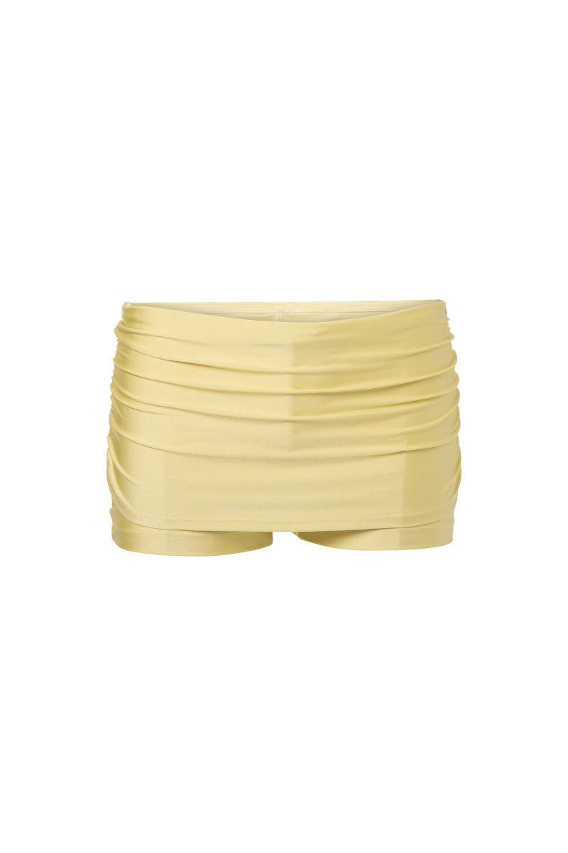 Suncillo Dusty Butter Yellow Skort, lightweight casual shorts with front pleats and side pockets, on a neutral background.
