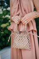 Adriana Castro nude leather shoulder bag from La Red Leather collection, featuring a sleek, minimalist design and smooth texture.