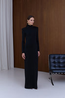 Black Cintia open-back maxi dress by UNDRESS, flowing fabric, elegant design, and open-back detail perfect for formal occasions.