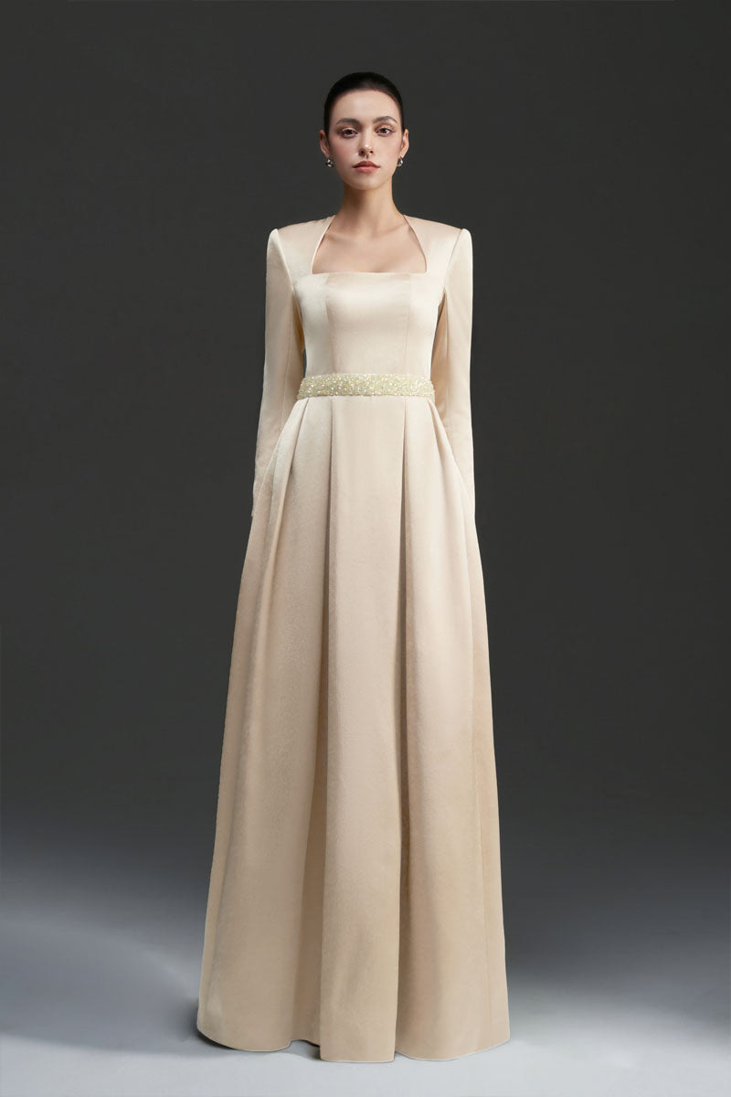 Gold silk taffeta gown by I.H.F Studio featuring elegant flowing fabric and a sophisticated design.