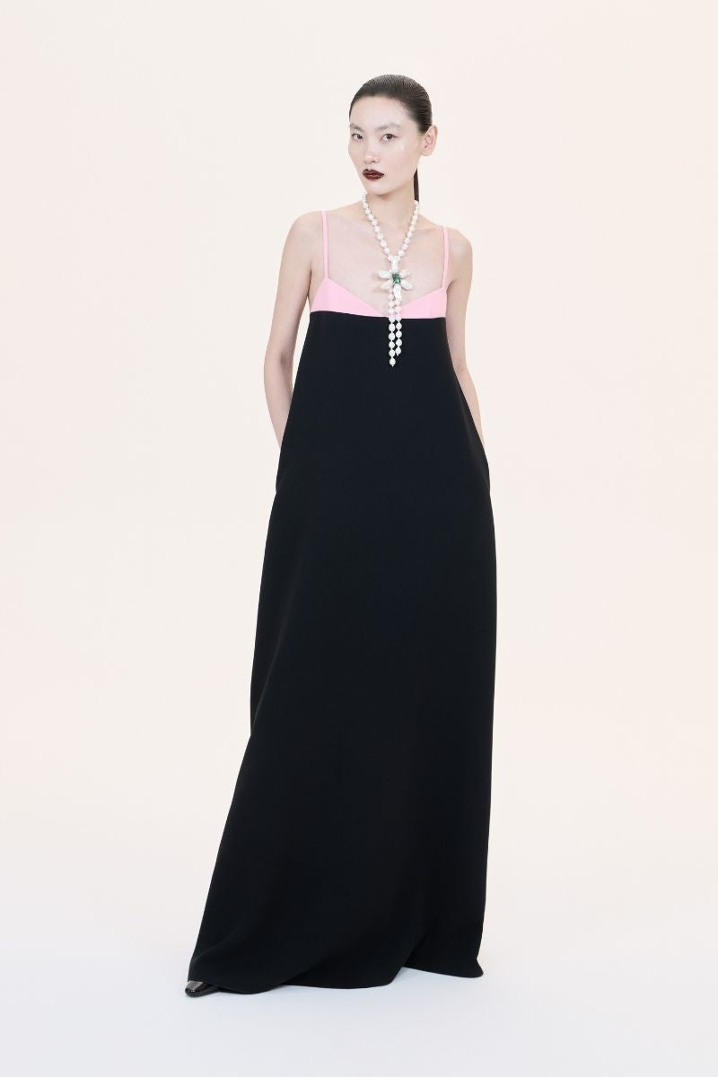 Nihan Peker Siena strapless gown in elegant fabric with a fitted bodice and flowing skirt, designed for formal occasions.