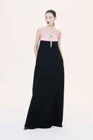 Nihan Peker Siena strapless gown in elegant fabric with a fitted bodice and flowing skirt, designed for formal occasions.