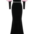 Elegant Nur Karaata Royal Allure gown with intricate detailing and flowing fabric, showcased on a model.