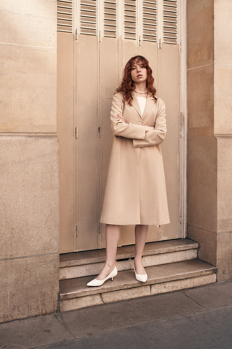 Beige wool blazer from Chictopia, stylish coat with tailored fit, featuring lapels and button closure, perfect for smart casual wear.